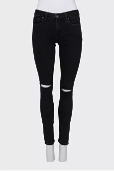 Skinny jeans with rips