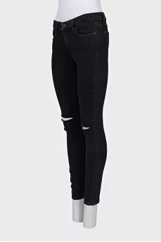 Skinny jeans with rips