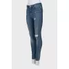 Ripped mid-rise blue jeans