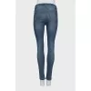 Ripped mid-rise blue jeans
