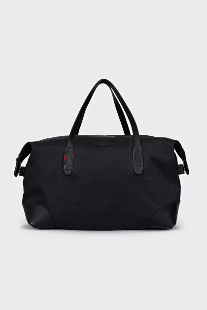 Black textile bag with a signature print