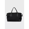 Black textile bag with a signature print