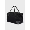 Black textile bag with a signature print