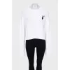 White knitted sweater with signature print