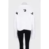 White knitted sweater with signature print