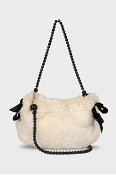 Fur bag with beaded handle