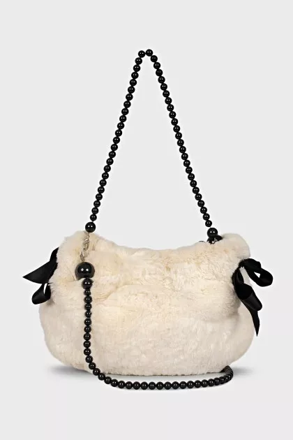 Fur bag with beaded handle