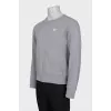 Men's gray sweatshirt with a patch