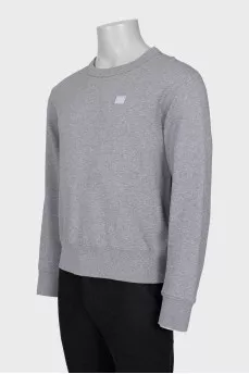 Men's gray sweatshirt with a patch