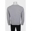 Men's gray sweatshirt with a patch