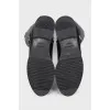 Leather boots insulated with fur