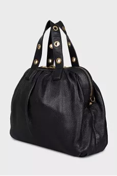 Leather bag with decorated handles