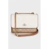 Leather bag with signature print
