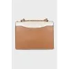 Leather bag with signature print