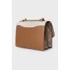 Leather bag with signature print