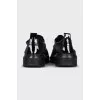 Black sneakers with patent toes