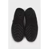 Black sneakers with patent toes