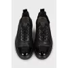 Black sneakers with patent toes