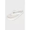 Leather flip-flops with a shaped sole