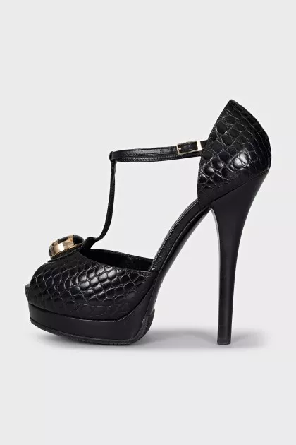 Black leather sandals with gold decor