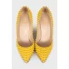Yellow leather pumps with studs
