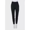 Tapered trousers with a belt