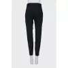 Tapered trousers with a belt