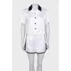 White suit with contrasting inserts