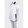 White suit with contrasting inserts