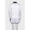 White suit with contrasting inserts