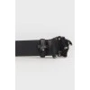 Rivet belt and proprietary buckle