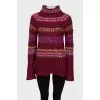 Long sweater decorated with sequins