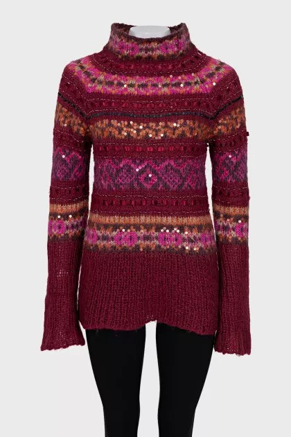 Long sweater decorated with sequins