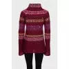 Long sweater decorated with sequins