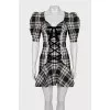 Plaid dress decorated with ties