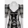 Plaid dress decorated with ties