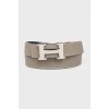 Bilateral belt with a proprietary buckle