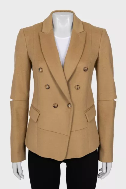 Wool jacket with holes on the sleeves