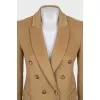 Wool jacket with holes on the sleeves