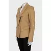 Wool jacket with holes on the sleeves
