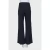 Flared trousers with a bow