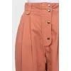 High-waisted trousers with pockets