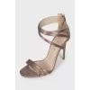 Stiletto heel sandals with a zipper