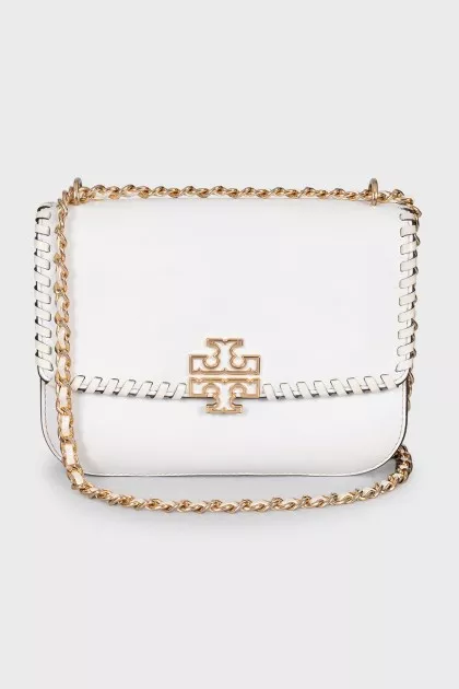 White bag with a gold logo