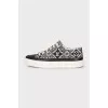 Blue textile sneakers with a signature print