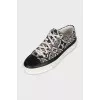 Blue textile sneakers with a signature print