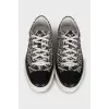 Blue textile sneakers with a signature print