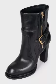 Leather ankle boots with a zip and strap