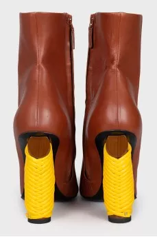 Brown ankle boots with an accent heel