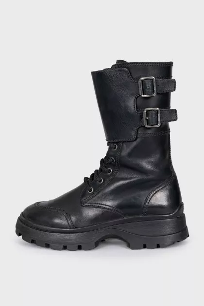 Black boots with a wide strap